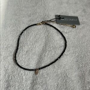 Elegant Black Beaded Necklace with Gold Accent